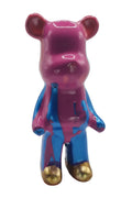 Colorful bear-shaped toy with pink and blue body on a white background