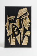 Relief Faces in gold leaf