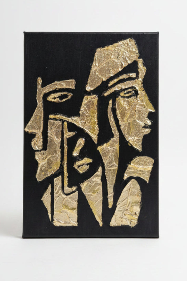 Relief Faces in gold leaf