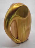Gold-colored ceramic elephant on a white background